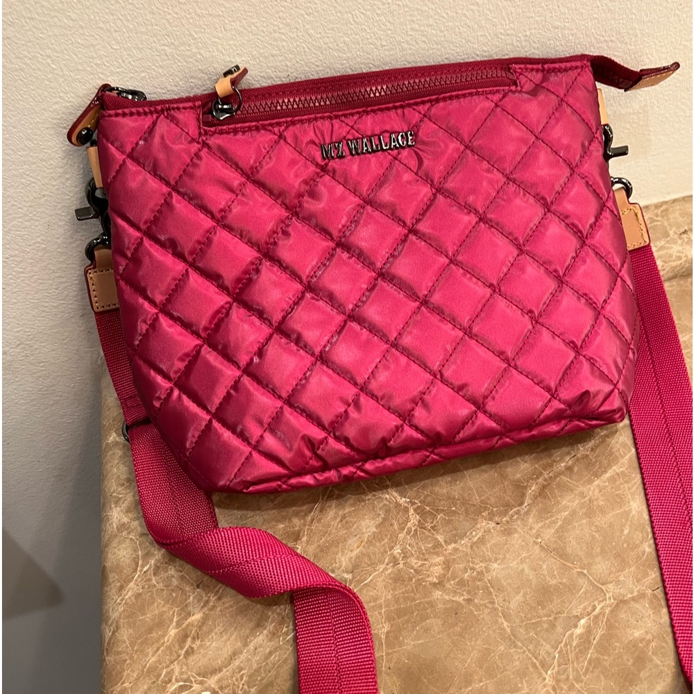 Brand new used twice, beautiful raspberry color, excellent condition.